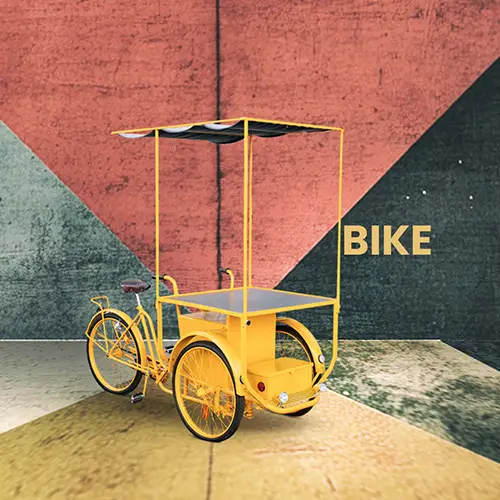 Una bici a tre ruote con piano da lavoro per showcooking e caterinig